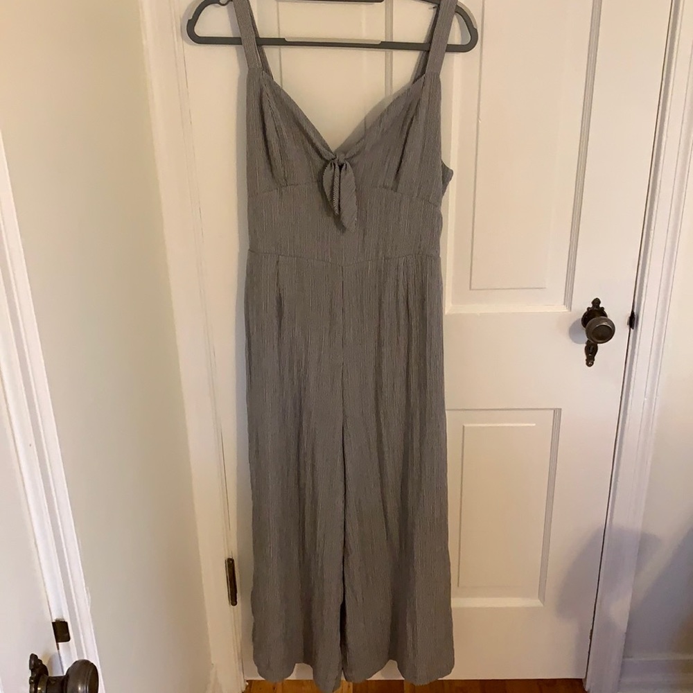 Wide-leg jumpsuit with adjustable straps & pockets